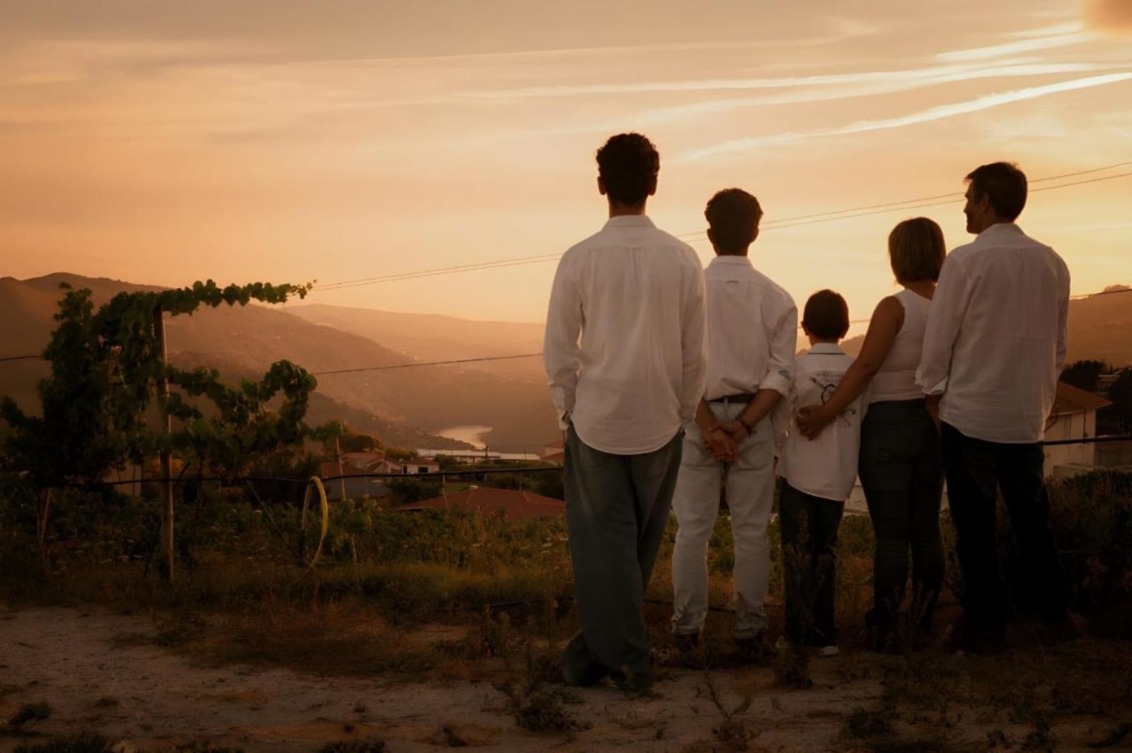 The Canhoto family watching the sunset over the Douro