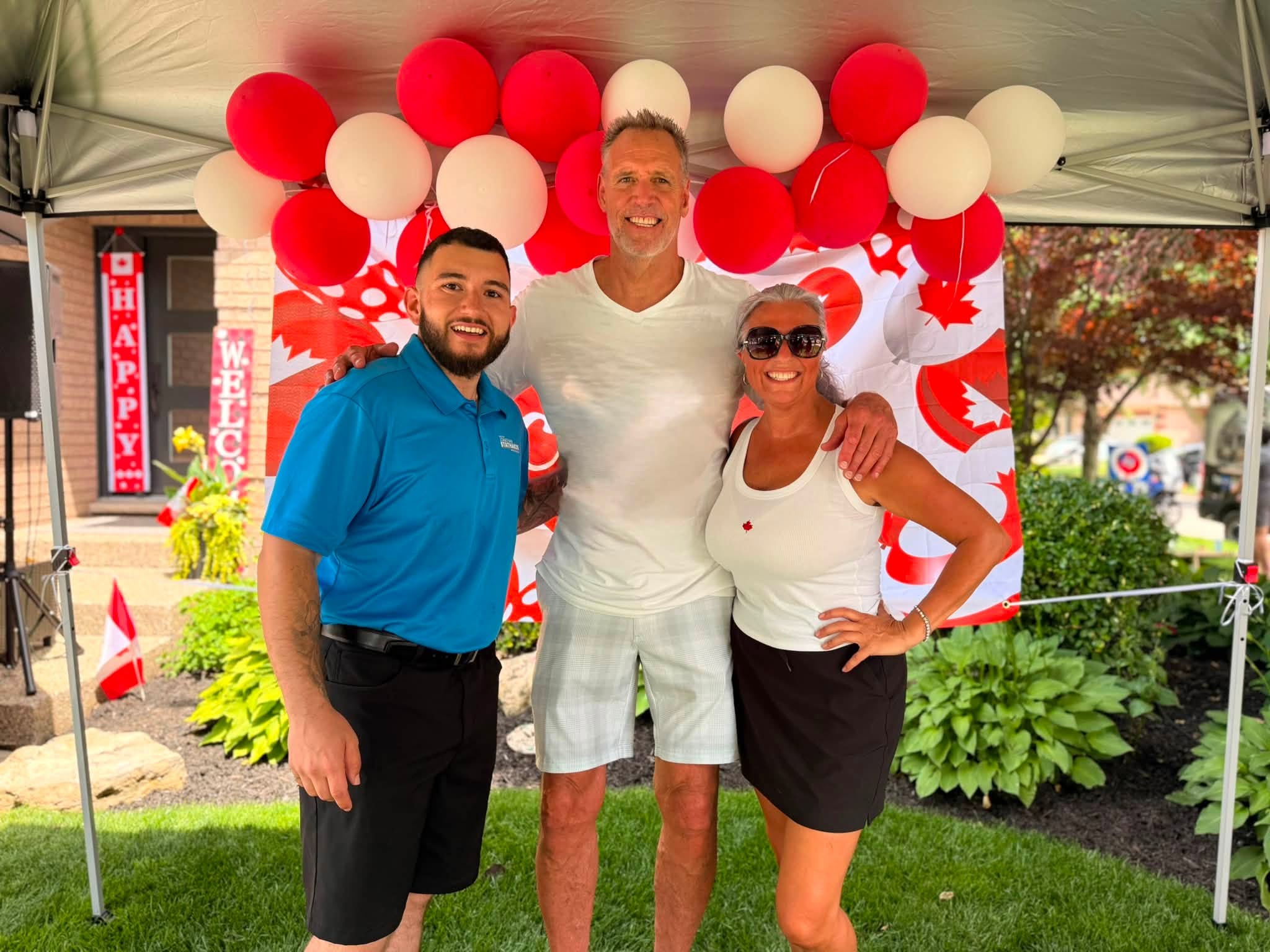 Jonathan Stathakos at a Canada Day BBQ with Nancy and Barry