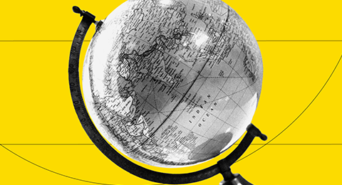 Globo terrestre, sobre um fundo amarelo