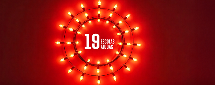 Título "19 Escolas, 19 Ajudas" e jogo de luzes