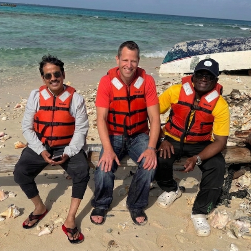 ECO Canada Director of Professional Services Devant Maharaj and ECO Canada CEO Kevin Nilsen meeting with fish harvesters in Jamaica alongside partners from the Caribbean Maritime University