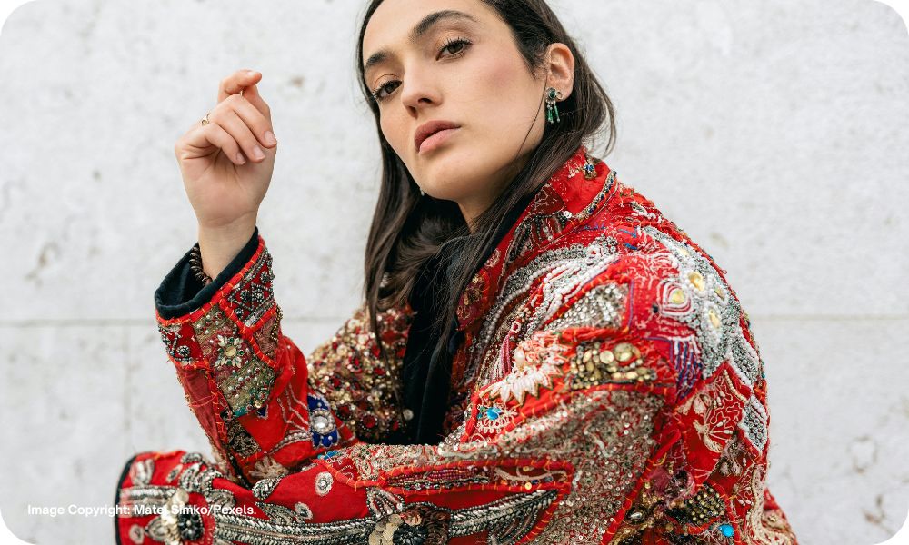 The image displays a stylish woman who wears Indo Western fashion. Copyright Matej Simko/Pexels.