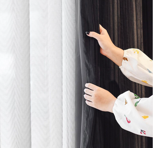 a dark dimout with a white sheer, highlighting our expert curtain service.