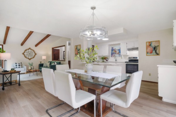 Renovated open floor plan photographed to show its usable space
